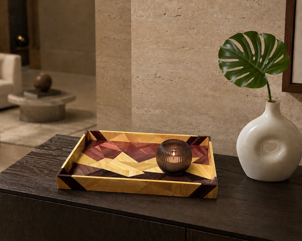 Kra Design geometric straw inlay decorative tray with wood grains in warm earth tones. Features a candle inside.