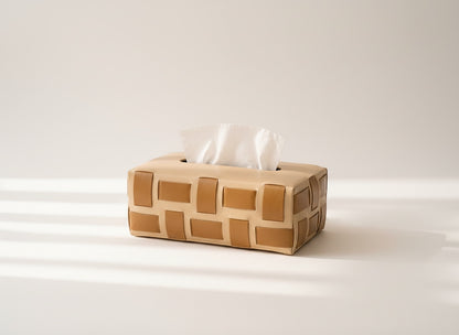 Kra Design beige genuine leather tissue box with woven pattern and ultra suede lining.