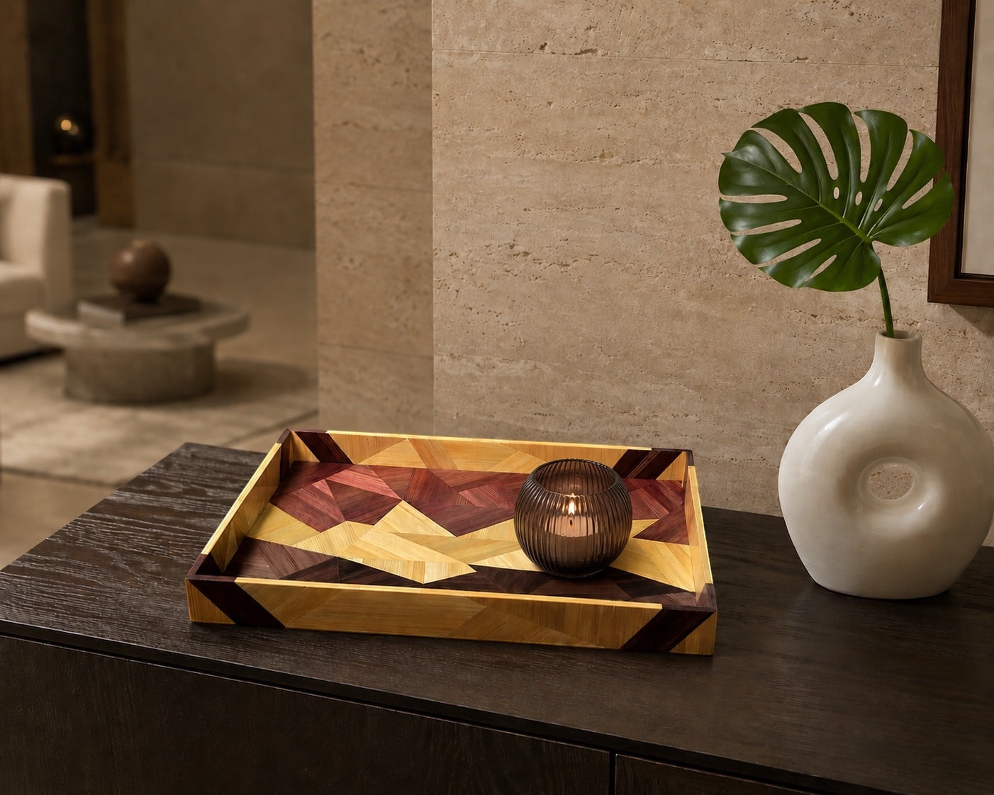 Kra Design geometric straw inlay decorative tray with wood grains in warm earth tones. Features a candle inside.