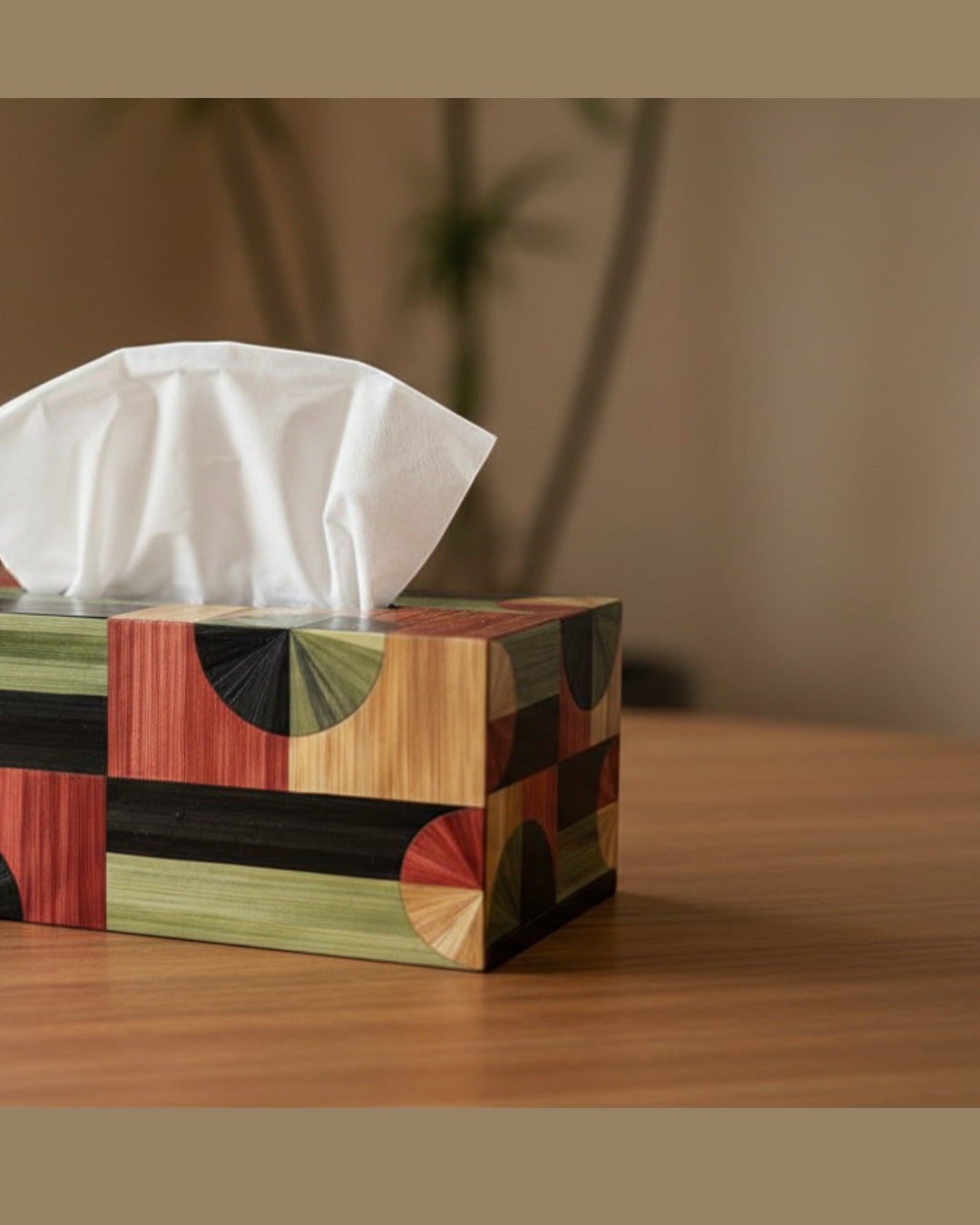 Kra Design decorative geometric tissue box holder with wood tones, green, and red pattern. Modern art accent.