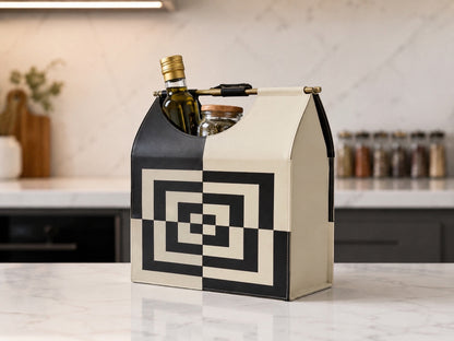 Kra Design luxury leather lunch basket in cream and black geometric pattern. Holds olive oil and spices.