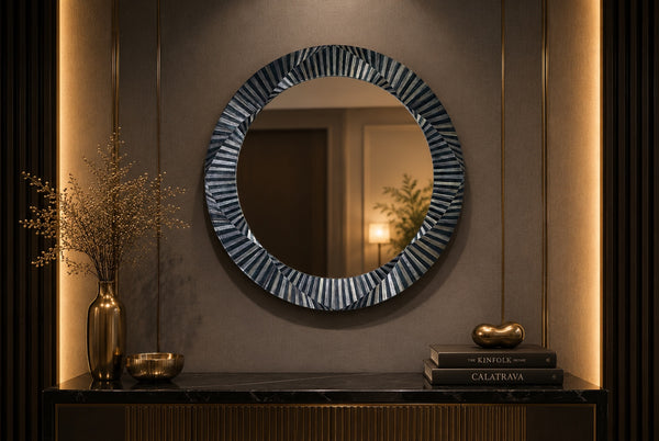 Kra Design round inlay mirror with a decorative geometric frame in dark and light segments. Perfect for entryway or living room.